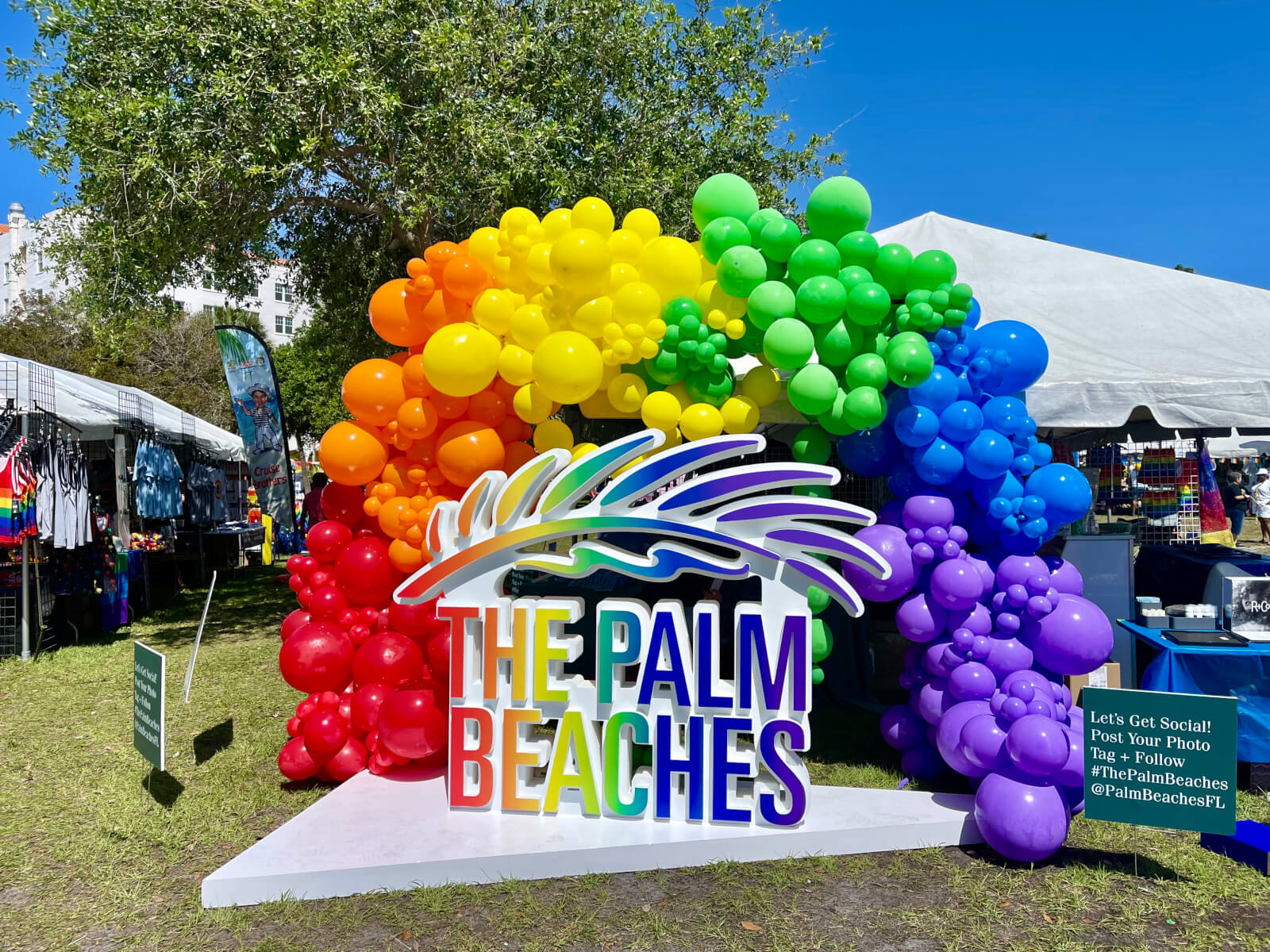 The Palm Beaches logo surrounded by ballons