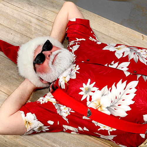 Santa Claus wearing sun glasses